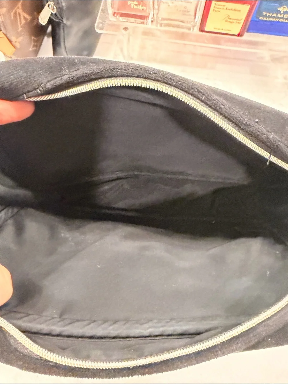 CHANEL Black Suede Cosmetic Pouch with Embossed Logo